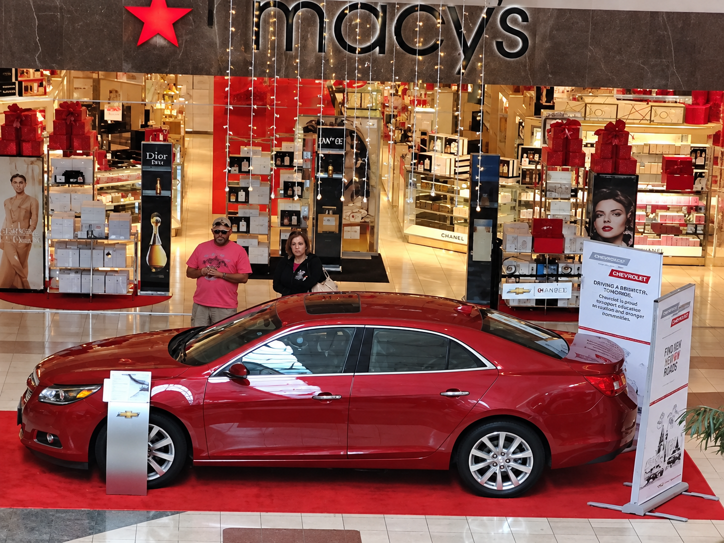 Chevrolet Malibu holiday activation outside Macy’s with brand ambassadors